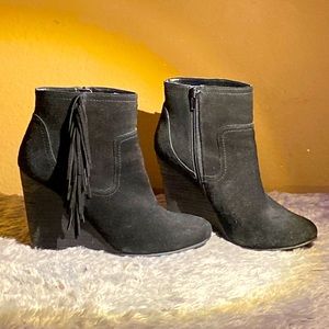 Black low boots with fringe